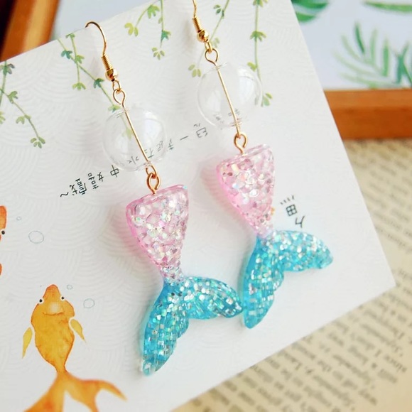 loves_cases Jewelry - New 18K gold plated bling fish tail Earrings